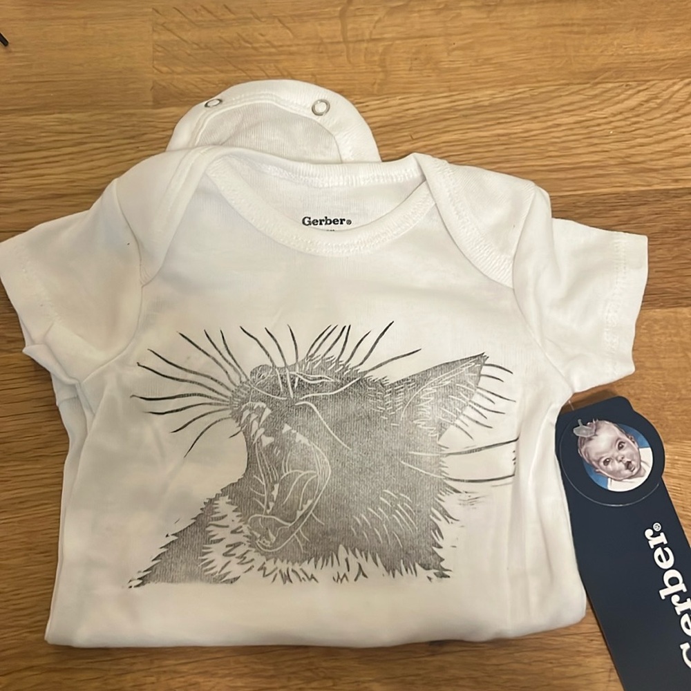 Hand printed newborn onesie